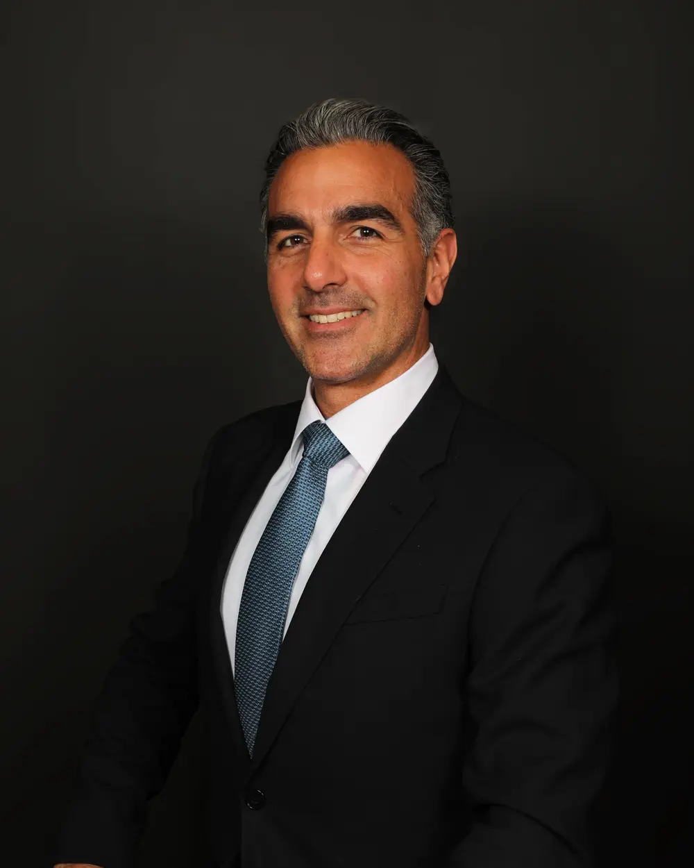 Professional headshot of Dr. Andrew S. Dorizas, MD, FAAD, ACMS, Double Board-Certified Dermatologist and Mohs Surgeon